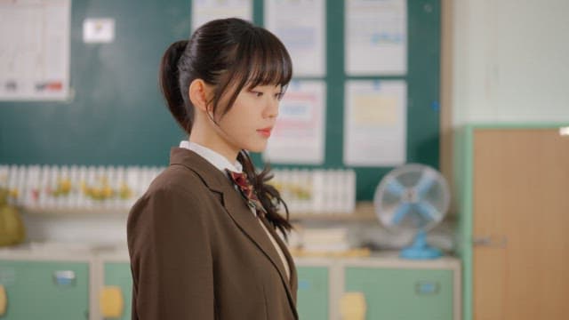 Students walking around the classroom