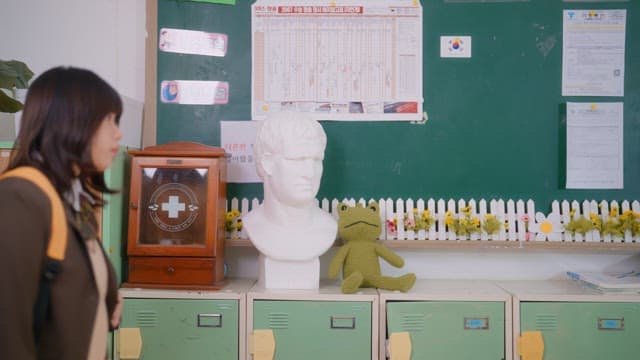 Student walking into a classroom