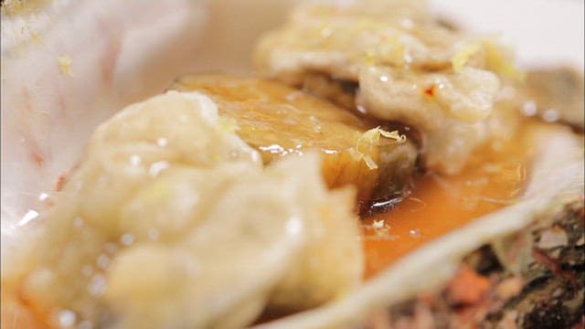 Appetizingly plated fried tropical oyster