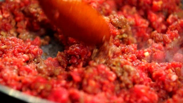 Ground beef being cooked in a pan
