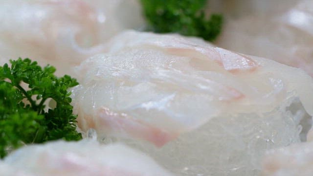 Fresh sashimi with parsley garnish