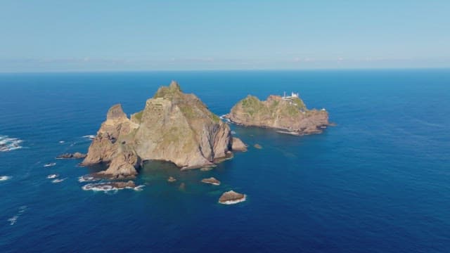 Rocky islands surrounded by blue ocean