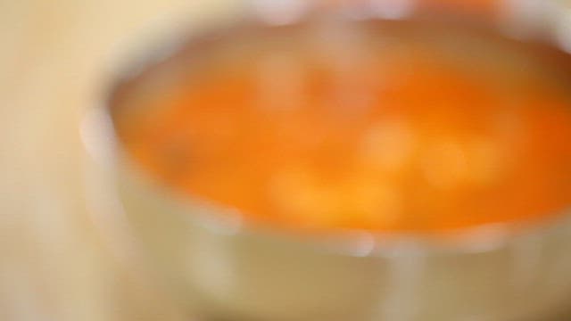 Bowl of spicy hand-pulled dough soup on a table