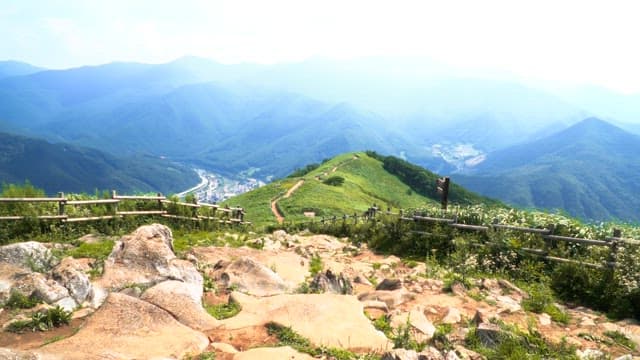 Green hiking trails and majestic mountains