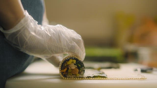 Rolling Kimbap Filled with Ingredients