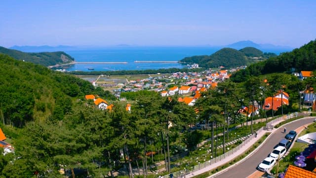 Aerial View of a Coastal Town Surrounded by Nature