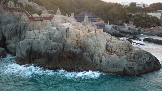 Haedong Yonggungsa Temple located on the cliffs of the twilight coast