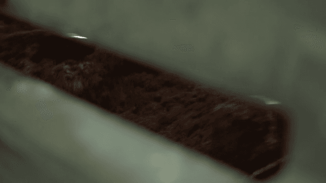 Soil being processed in a machine