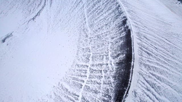 Snow-covered volcanic crater in winter