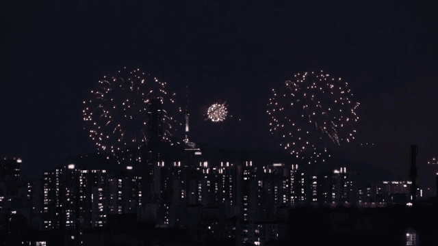 City skyline with fireworks at night