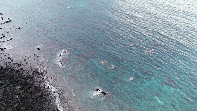 Rocky shoreline with clear ocean water