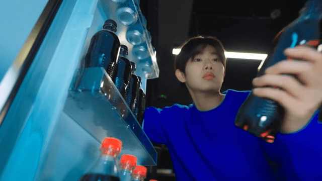 Person Taking Beverage Out from Fridge at Night