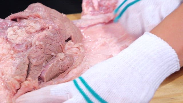 Preparing Meat on a Cutting Board