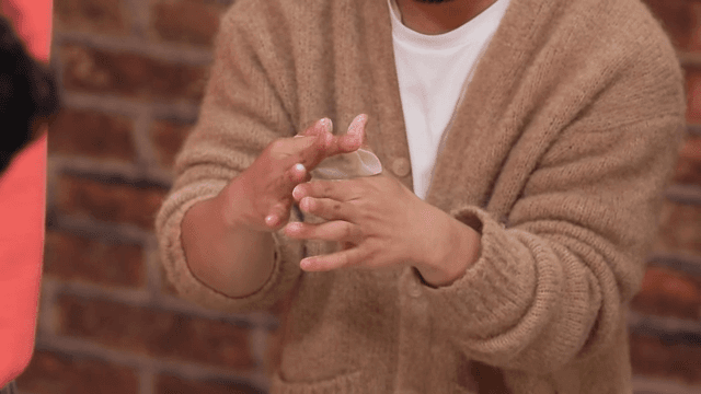 Making dumplings with careful hands indoors