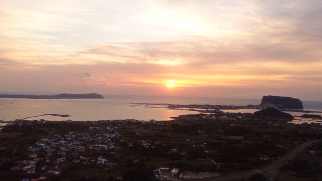 Sunset over a coastal landscape
