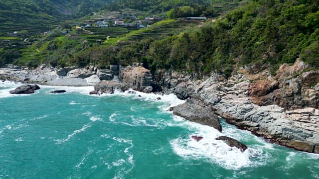 Rouph Rocky Shoreline by Terraced Fields