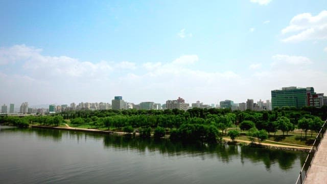Panoramic View of a Riverside Cityscape
