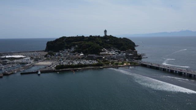Island on the Sea with Coastal Village and Bridge