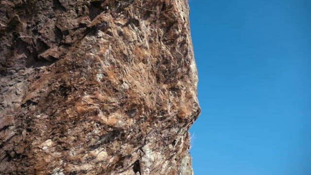 Scenic View of a Mountain Cliff Over Sea