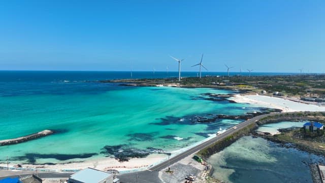 Coastal landscape with wind turbines