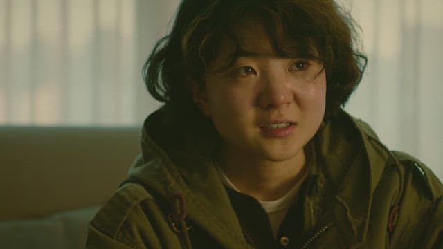 Woman smiling with tears in her eyes