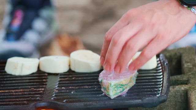 Fresh parrotfish grilled on an outdoor barbecue grill