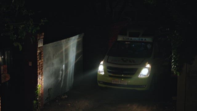 Ambulance Moving to Emergency at Nighttime 