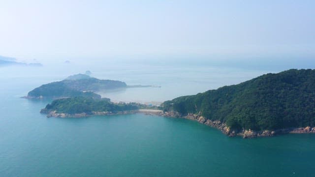 Serene seascape with remote forested islands