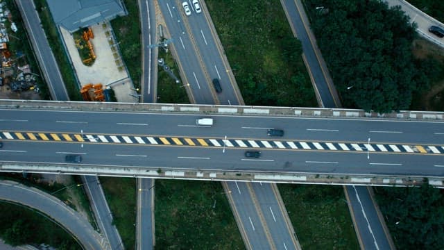 Highways and overpasses with many cars passing by