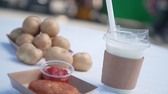 Potato Croquette with Ketchup and a Potato Shake on a Table
