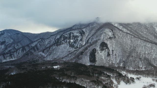 Majestic Landscape of Snow-Capped Mountains in Winter