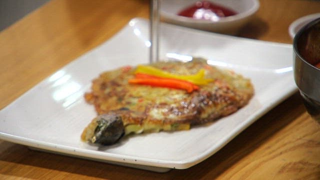 Eggplant tortang talong served on a plate