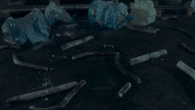 Melted Objects Rolling Around at the Charred Scene of Fire Accident