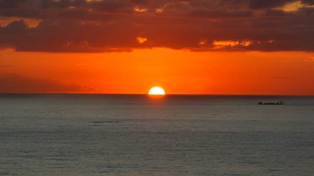 Sunset over the ocean with vibrant colors