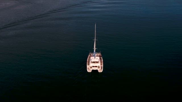 Sailing yacht on tranquil ocean waters