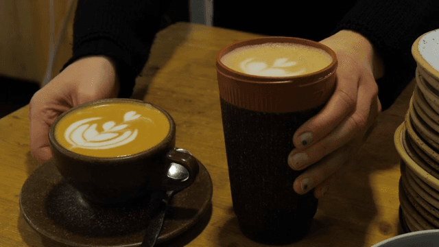 Two Cups of Cafe Latte Served on a Table in a Cozy Cafe
