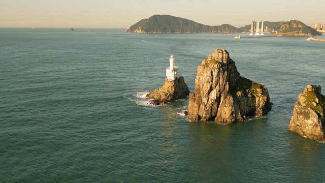 Lighthouse on a rocky island in the sea