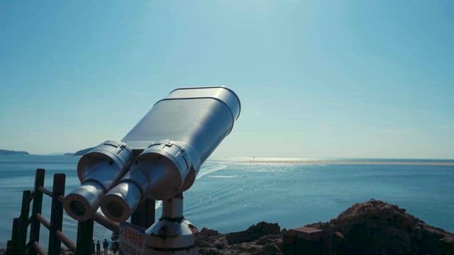 Coastal Viewpoint with Telescopes and Sea