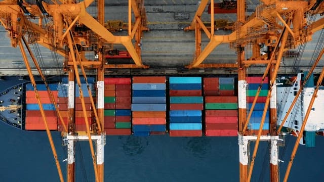 Overhead View of Cargo Ship Loading Containers