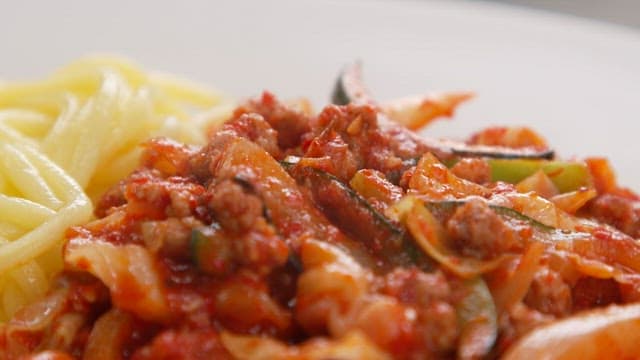 Noodle Dish Topped with Spicy Stir-fry Sauce