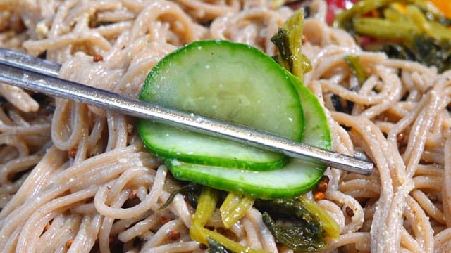 Chopstickful of buckwheat noodles with cucumber