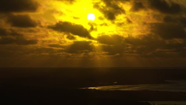 Rays of Sunlight Through Clouds at Dusk