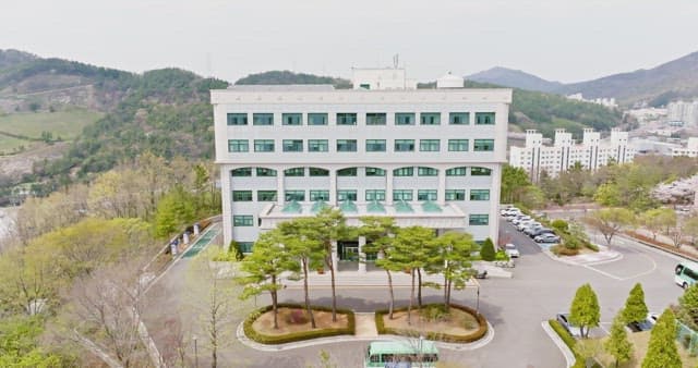 Modern building surrounded by trees