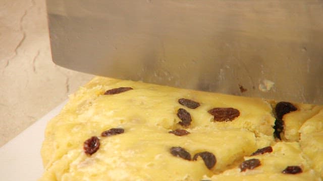 Freshly steamed chestnut bread cut with a knife