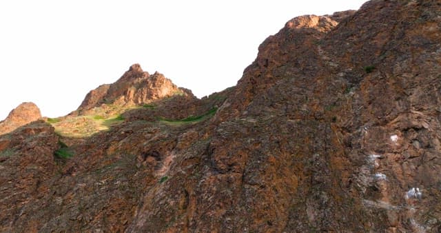 Rocky mountain landscape with sunlight