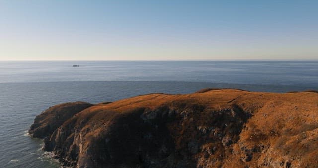 Coastal Cliffs Overlooking Calm Sea