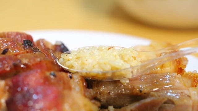 Glossy and Delicious Bowl of Rice Topped with Chinese BBQ Pork