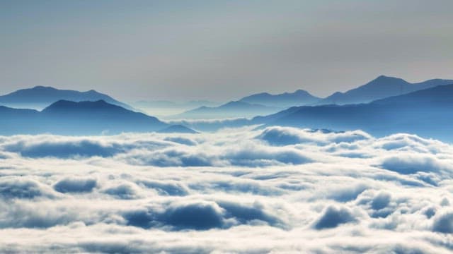 Mountains surrounded by clouds