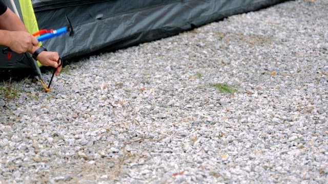 Securing a tent peg on rocky ground