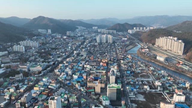 Aerial View of a Bustling Urban Area with Dense Buildings